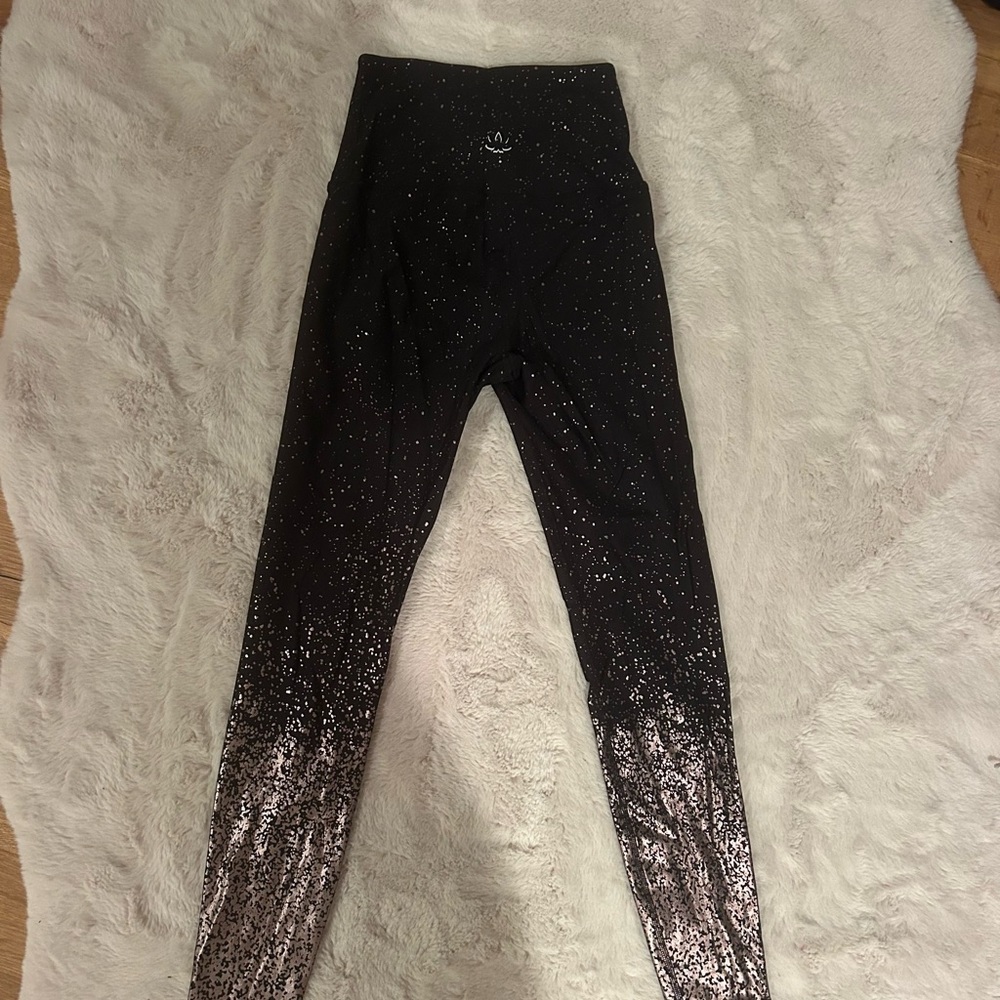 Beyond Yoga small black leggings with gold splatter pattern
